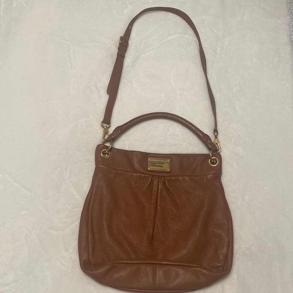 Marc Jacoba purse. Excellent condition slightly used. Look good and clean.